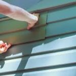repairing cracked or loose siding panels