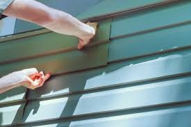 repairing cracked or loose siding panels