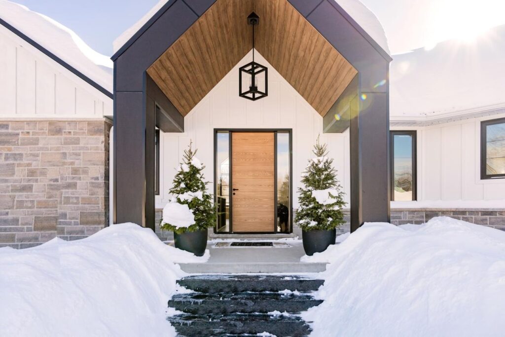 Exterior front door installation for a winter-ready home