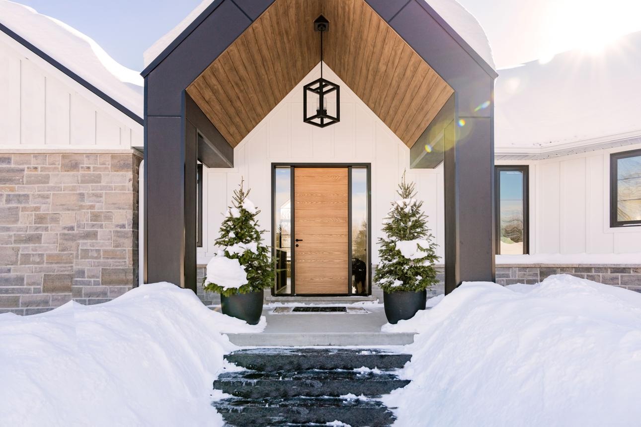 Exterior front door installation for a winter-ready home
